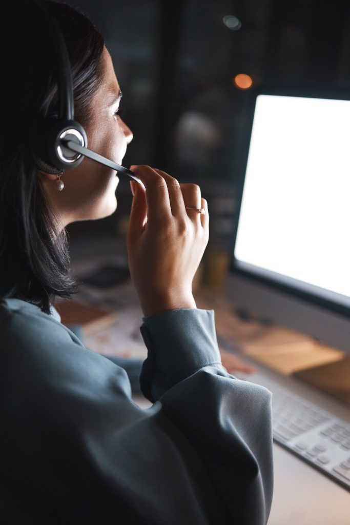 Business woman, consultant and call center in telemarketing, customer support or service for night