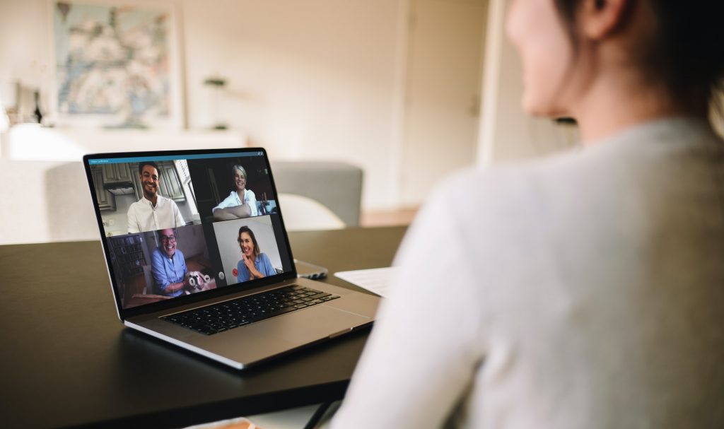 Woman attending a video call powered by Voice Over IP Technology