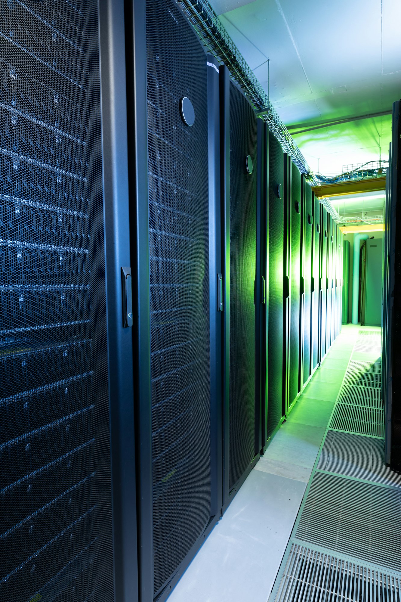Data center with multiple rows of fully operational server racks